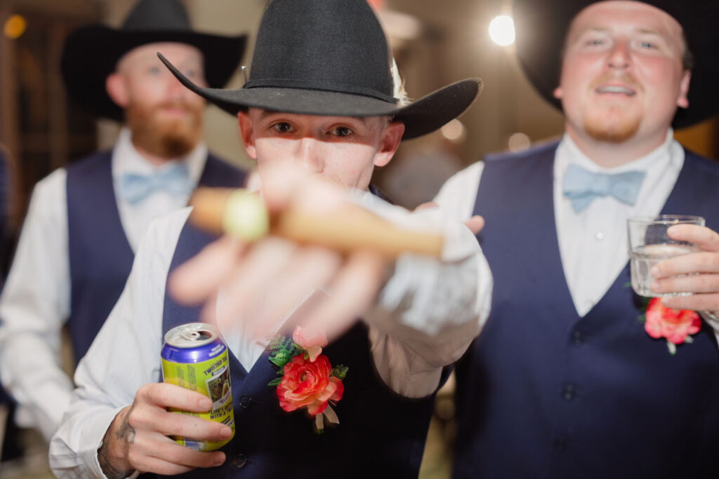Elegant reception table decor with candles and florals at an Arizona wedding.