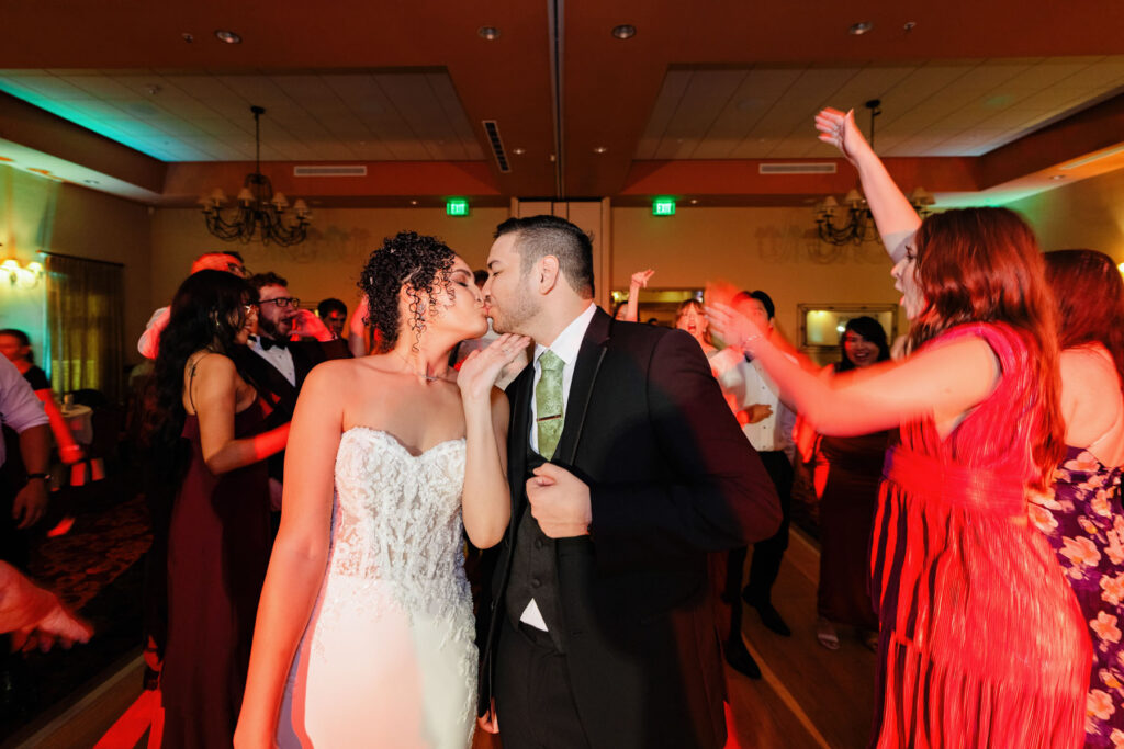 Bride & groom share a kiss on the dance floor for a Tucson luxury wedding.