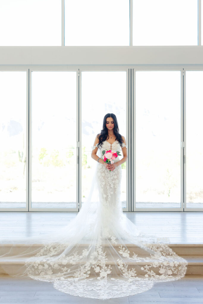 Candid wedding photo from an intimate Arizona celebration in the desert.