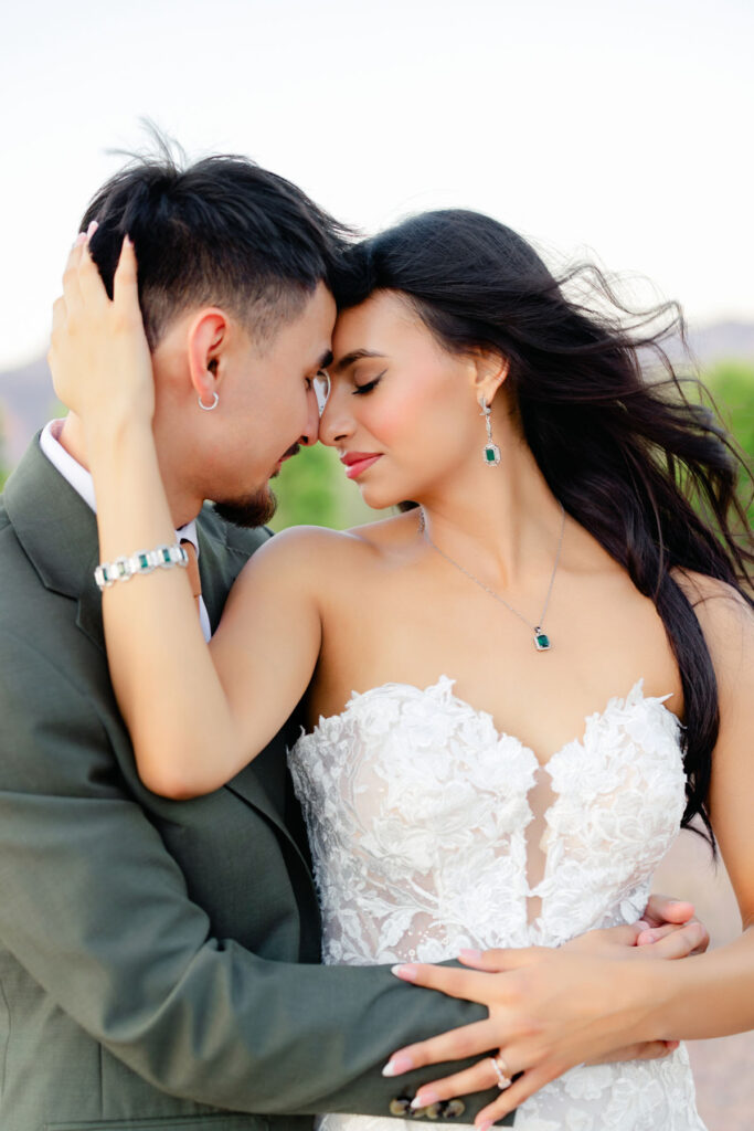 Scenic desert wedding photo with mountains and open sky near Phoenix, Arizona.