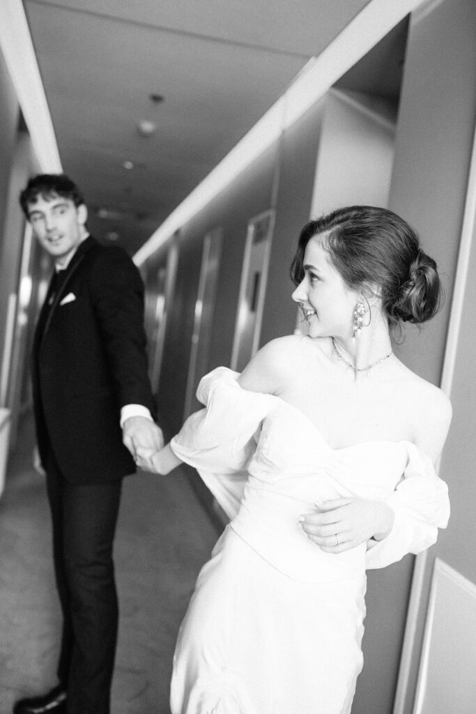 Couple taking engagement photos in  hotel valley ho in Scottsdale, AZ.