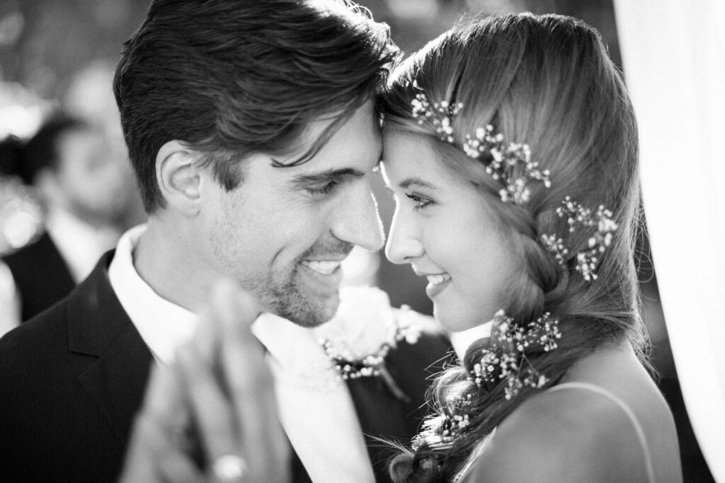 Wedding ceremony on the lawn at Royal Palms Resort in Phoenix with Camelback Mountain views.